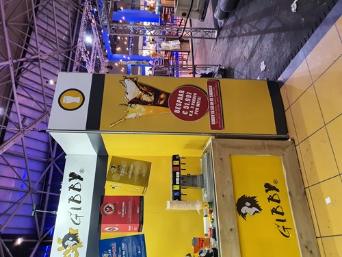 Gibby booth, savings banner and dispensing line